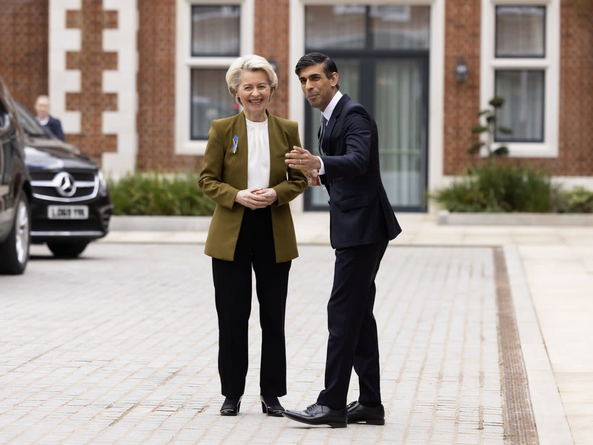 Rishi Sunak greets Ursula Von Der Leyen at the Fairmont Windsor Park hotel (PA)