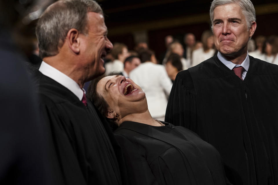 Supreme Court Chief Justice John Roberts, left, Associate Justices Elena Kagan and Neil Gorsuch, right, stand in the House chamber before President Donald Trump gave his State of the Union speech to a joint session of Congress, Tuesday, Feb. 5, 2019 at the Capitol in Washington. (Doug Mills/The New York Times via AP, Pool)