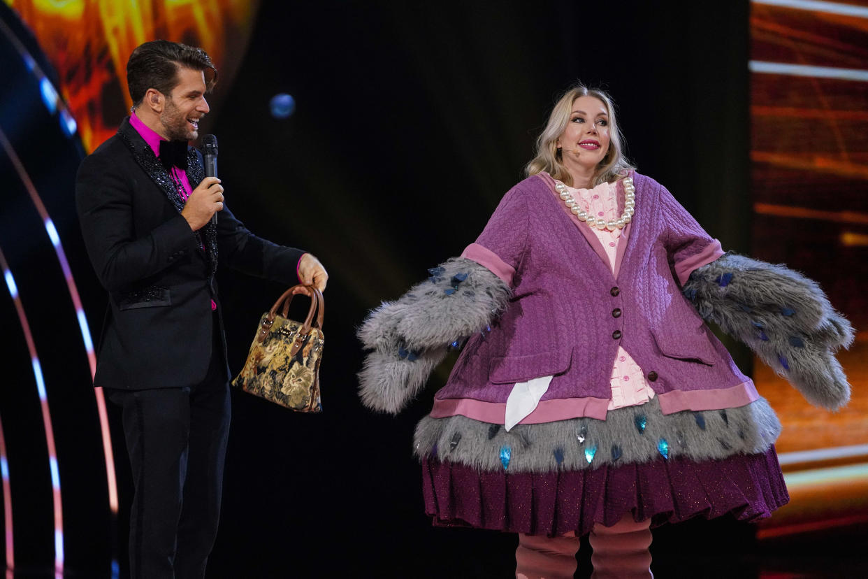 Joel Dommett and Katherine Ryan as Pigeon is unmasked.