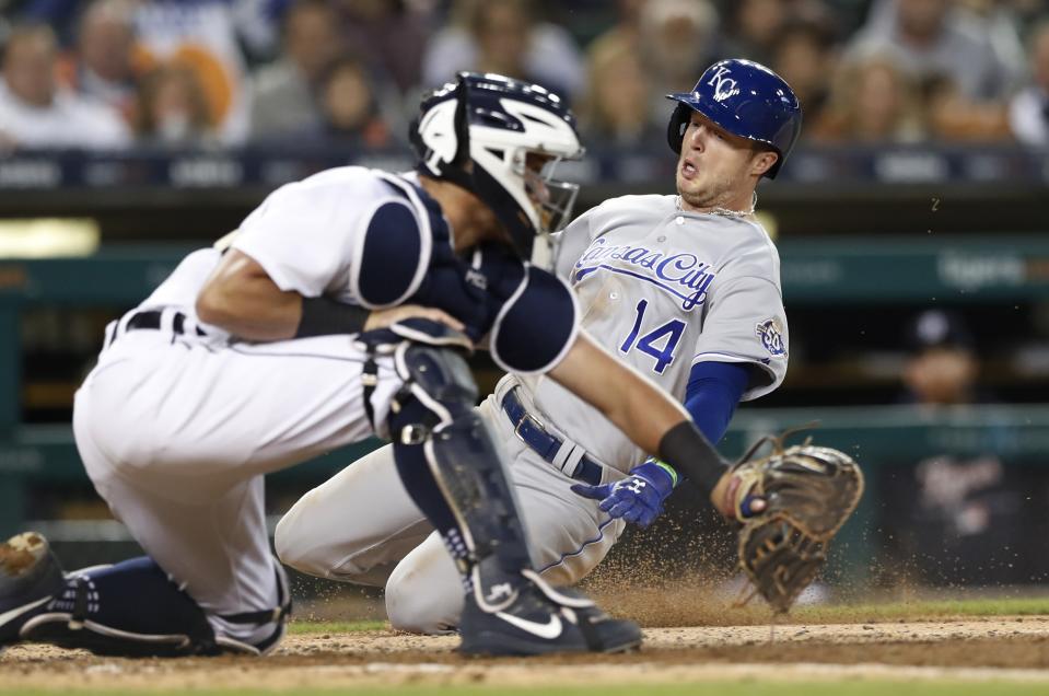 Kansas City Royals' Brett Phillips beats the throw to Detroit Tigers catcher James McCann to score during the eighth inning of a baseball game Saturday, Sept. 22, 2018, in Detroit. (AP Photo/Carlos Osorio)