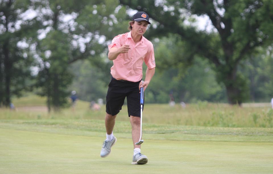 Brighton's Levi Pennala pumps his fist after sinking a putt during the state Division 1 golf tournament Saturday, June 10, 2023 at The Meadows in Allendale.