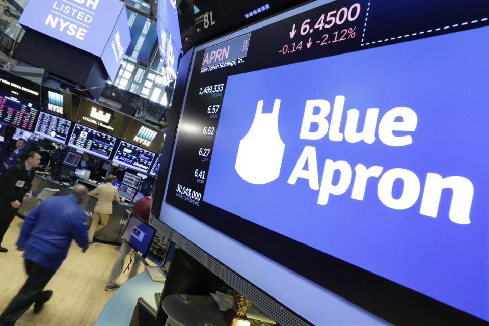 FILE- The Blue Apron logo appears above a trading post on the floor of the New York Stock Exchange, July 18, 2017. Wonder Group announced Friday, Sept. 29, 2023, that it is buying meal kit company Blue Apron for about $103 million as the company looks to enhance its offerings. (AP Photo/Richard Drew, File)