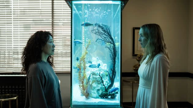 Eve (Sandra Oh) and Villanelle (Jodie Comer) staring through a fish tank in the final season of Killing Eve. The scene is an homage to Baz Luhrmann's Romeo + Juliet. (Photo: Anika Molnar/BBC America)