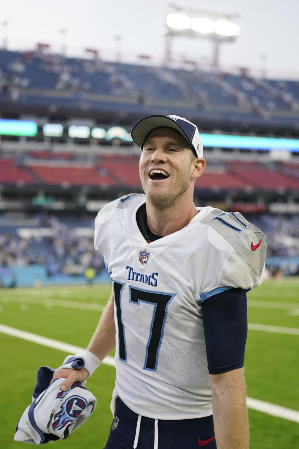 Tennessee Titans quarterback Ryan Tannehill smiles as he walks off the field after an overtime win over the Los Angeles Chargers in an NFL football game Sunday, Sept. 17, 2023, in Nashville, Tenn. (AP Photo/George Walker IV)