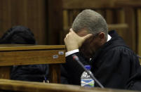 <p>South African chief state prosecutor Gerrie Nel, reacts as Judge Thokozile Masipa, reads her verdict during the state appeal hearing at the high court in Johannesburg, South Africa, Aug. 26, 2016. The State lost it’s appeal challenging Masipa’s six years prison sentence on Oscar Pistorius for the murder of his girlfriend, Reeva Steenkamp.(Photo: Themba Hadebe/AP) </p>