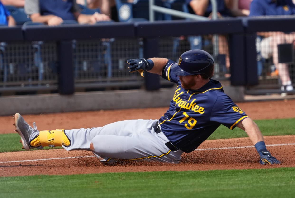 Oliver Dunn is one of 12 players on their first opening day roster with the Brewers.