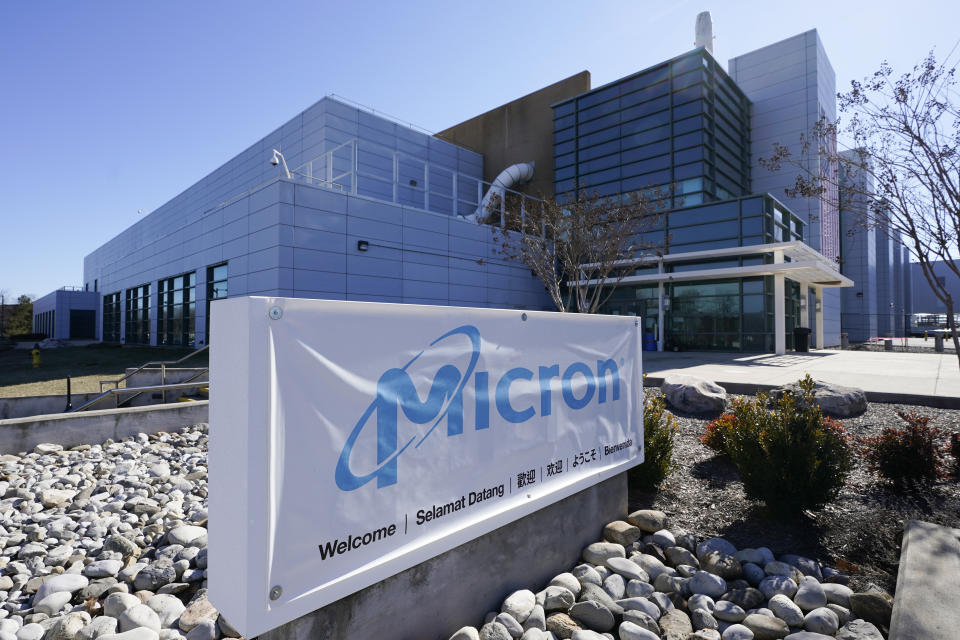 FILE - A sign marks the entrance to Micron Technology's automotive chip manufacturing plant on Feb. 11, 2022, in Manassas, Va. On Tuesday, Oct. 4, chipmaker Micron announced an investment of up to $100 billion over the next 20 years to build a plant in upstate New York that could create 9,000 jobs at the factory. (AP Photo/Steve Helber, File)