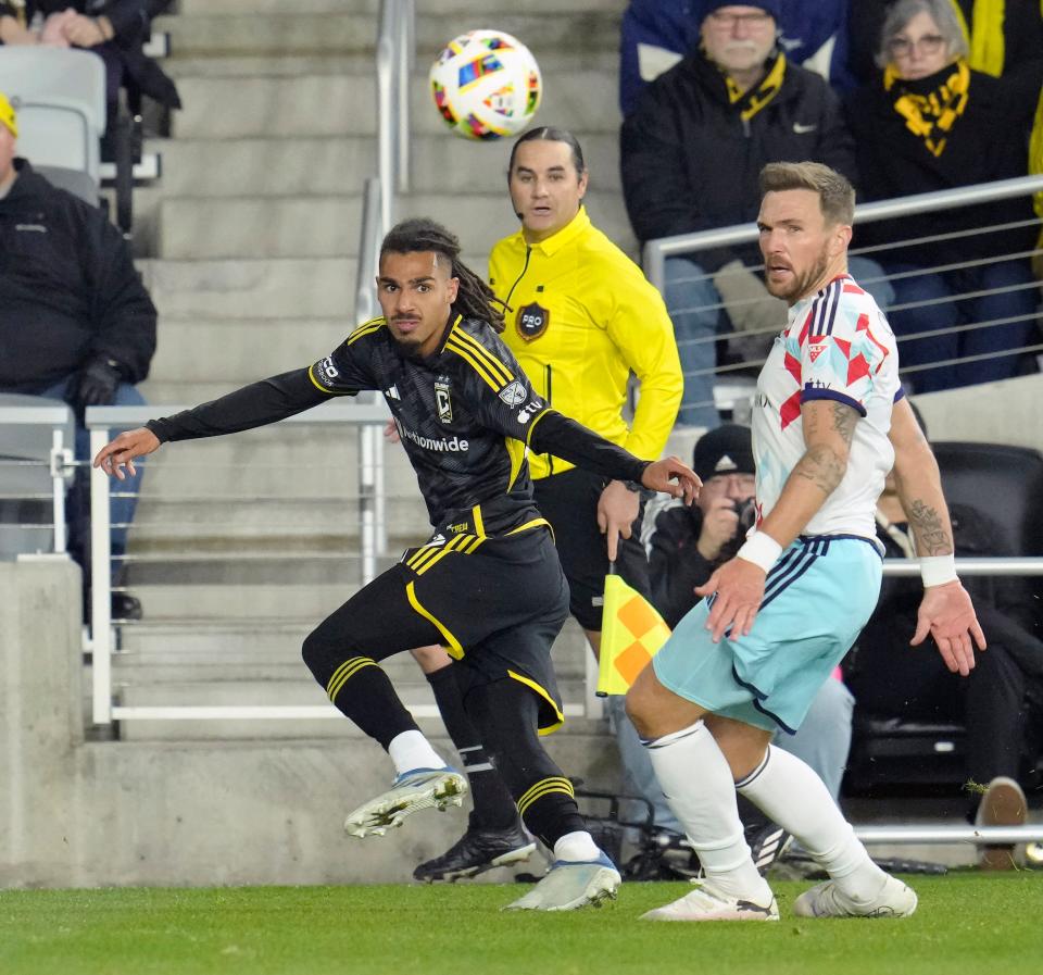 March 9, 2024; Columbus, Ohio, USA; 
Columbus Crew defender Mohamed Farsi (23) and Chicago Fire defender Rafael Czichos (5) compete for a ball during the second half of a soccer match Saturday at Lower.com Field. The Columbus Crew beat the Chicago Fire 2-1.