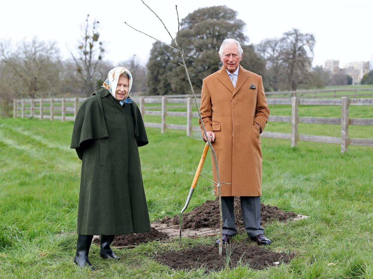 Queen and Prince Charles planting tree at Windsor earlier this year (Getty Images)