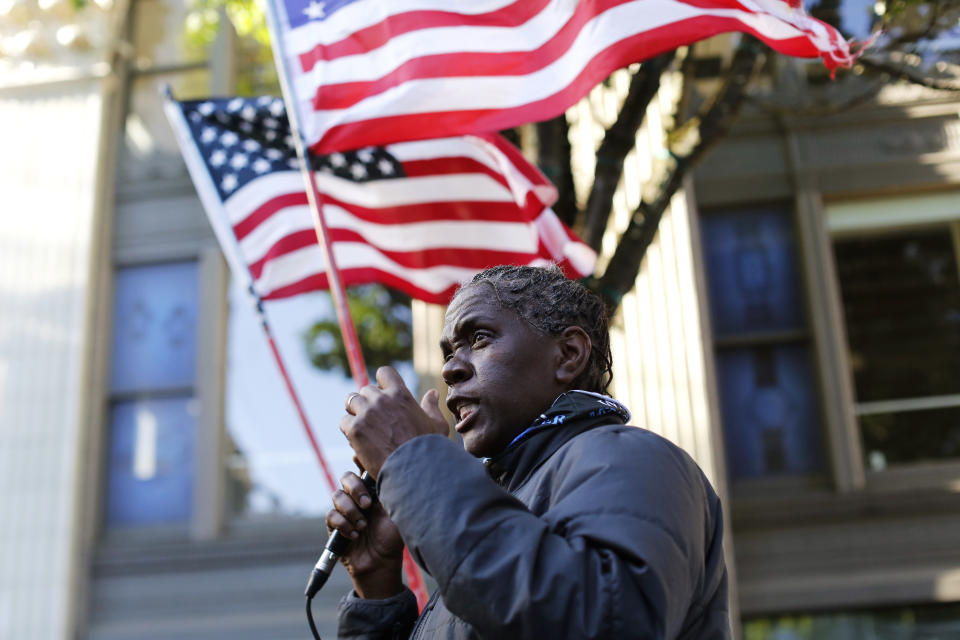 A protester demonstrates in and around Pioneer Square in Portland, Tuesday evening, June 2, 2020, following the death of George Floyd, a black man who died in police custody on Memorial Day in Minneapolis. (Sean Meagher/The Oregonian via AP)