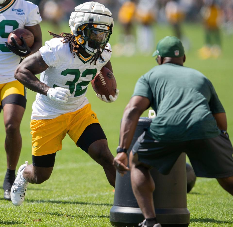 Green Bay Packers running back Lew Nichols III (32) runs through positional drills during practice on Saturday, July 29, 2023, at Ray Nitschke Field in Green Bay, Wis. Tork Mason/USA TODAY NETWORK-Wisconsin