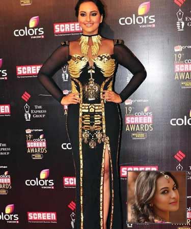 Kangana Ranaut's gold gown could not hide her curves well.