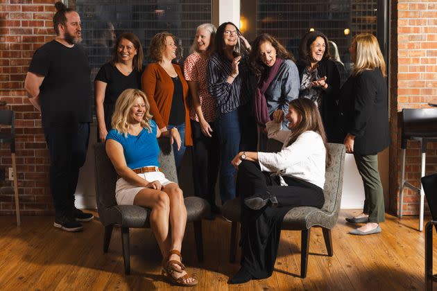 (Front from left) Alma Klein and Elizabeth Harris, co-founders of Sages, an employee resources group, pose for a portrait with members of Sages at Arc Worldwide, Inc. on Tuesday, Sept. 26, 2023 in Chicago, Ill. The focus of Sages is ending age discrimination and providing resources to employees 45 and up. (Taylor Glascock/for HuffPost)