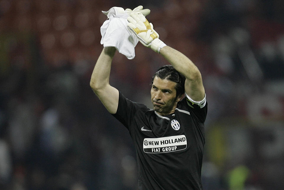 FILE - Juventus goalkeeper Gianluigi Buffon salutes the supporters at the end of the Italian Serie A soccer match between AC Milan and Juventus at the San Siro stadium in Milan, Italy, on May 10, 2009. At age 45 and after a career that included a World Cup title with Italy, a long list of trophies with Juventus and many years when he was considered among the best goalkeepers in soccer, Gianluigi Buffon announced his retirement on Wednesday, Aug. 2, 2023. (AP Photo/Alberto Pellaschiar)