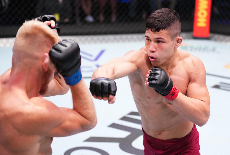 LAS VEGAS, NEVADA – SEPTEMBER 12: Jean Matsumoto of Brazil punches Kasey Tanner in a bantamweight fight during Dana White’s Contender Series season seven, week six at UFC APEX on September 12, 2023 in Las Vegas, Nevada. (Photo by Chris Unger/Zuffa LLC via Getty Images)