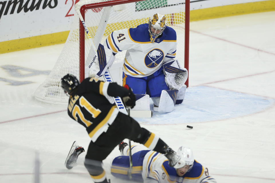 Buffalo Sabres goaltender Craig Anderson (41) prepares to block a shot by Boston Bruins left wing Taylor Hall (71) during the third period of an NHL hockey game Friday, Oct. 22, 2021, in Buffalo, N.Y. (AP Photo/Joshua Bessex)