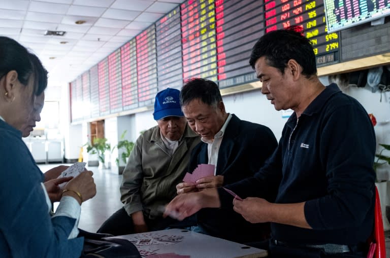 Shanghai's stock market has fallen by roughly a quarter this year, while the yuan has slipped about nine percent against the dollar