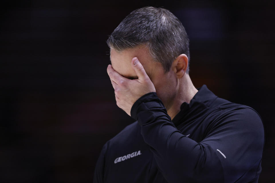 Georgia coach Mike White reacts to a play during the first half of the team's NCAA college basketball game against Tennessee, Wednesday, Jan. 25, 2023, in Knoxville, Tenn. (AP Photo/Wade Payne)