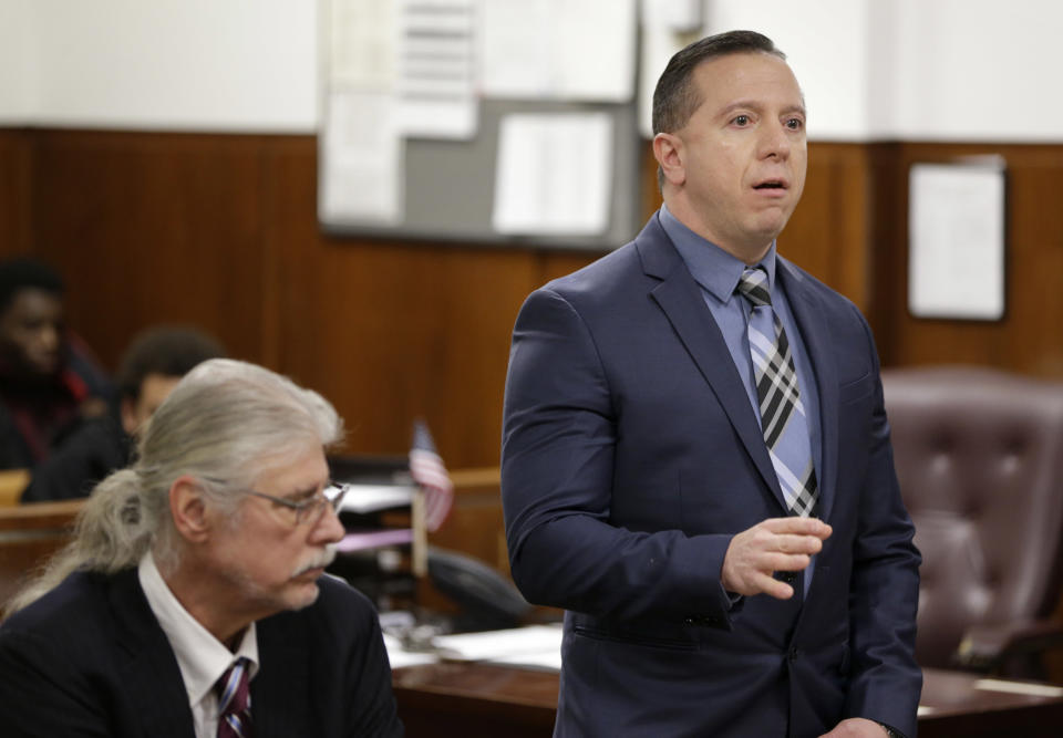 Johnny Hincapie speaks to the judge in a courtroom in New York, Wednesday, Jan. 25, 2017. Prosecutors dropped a case Wednesday against Hincapie, who spent a quarter-century behind bars in an infamous tourist killing before getting his conviction overturned. (AP Photo/Seth Wenig)