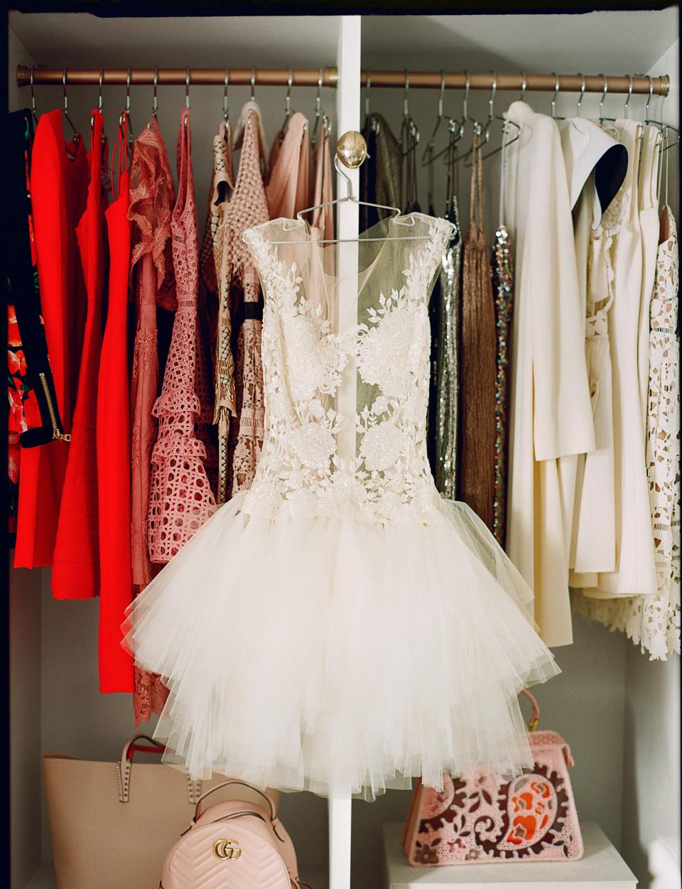 The Reem Acra dress Copeland wore at her wedding reception in 2016 hangs in the dressing room.