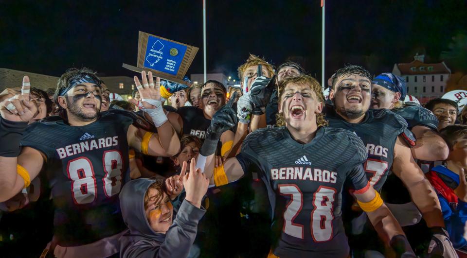 Bernards celebrates winning the program's first-ever sectional championship, topping Lakeland in the North 2 Group 2 final on Friday, Nov. 10 evening at the field at Bernards High School.