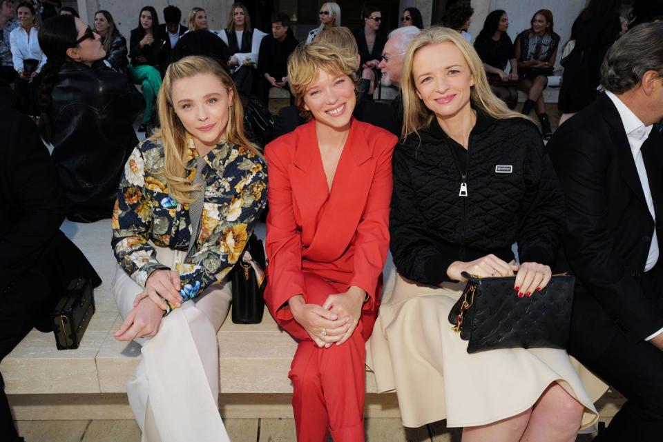 Chloë Grace Moretz and Léa Seydoux and Delphine Arnault at the Louis Vuitton 2023 Cruise Show