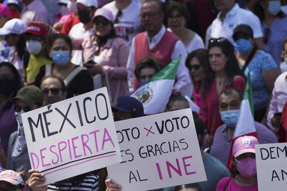 Citizen organizations march in support of Mexico's National Elections Institute as President Andrés Manuel López Obrador pushes to reform it, in Mexico City, Sunday, Nov. 13, 2022. (AP Photo/Marco Ugarte)