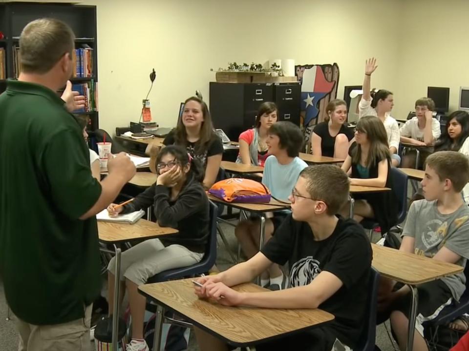 A scene of a classroom with a teacher and students from the documentary "American Teacher" (2011).