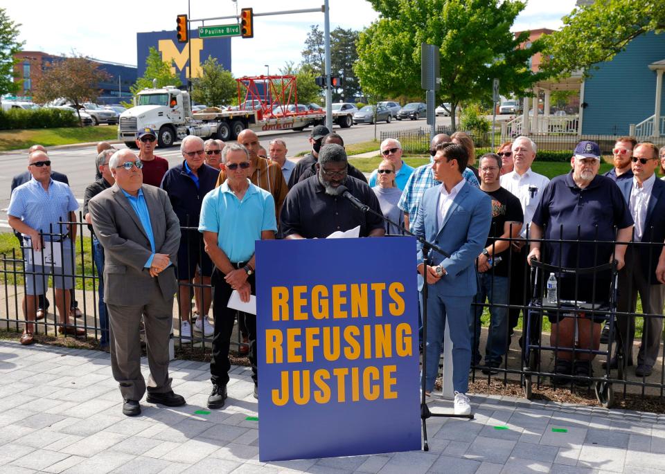 Jon Vaughn, a former Michigan football player who played for Bo Schembechler and in the NFL, talks to the media during a news conference near Michigan Stadium in Ann Arbor on Wednesday, June 16, 2021. Vaughn was one of three of the alleged victims of sexual abuse by Dr. Robert Anderson in the 1980s.