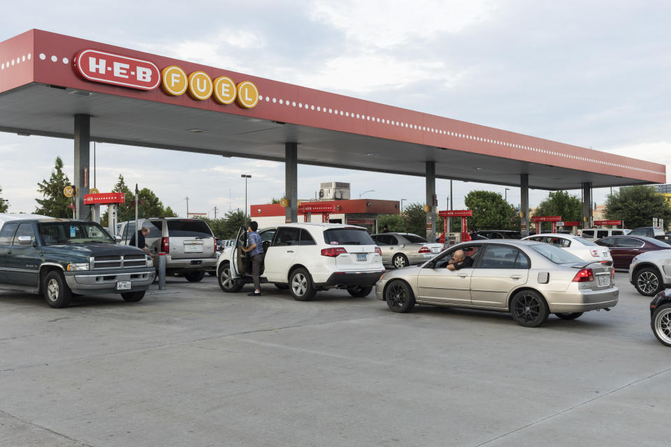 Customers wait in line to refuel at an HEB Fuel gas station in Houston.&nbsp;