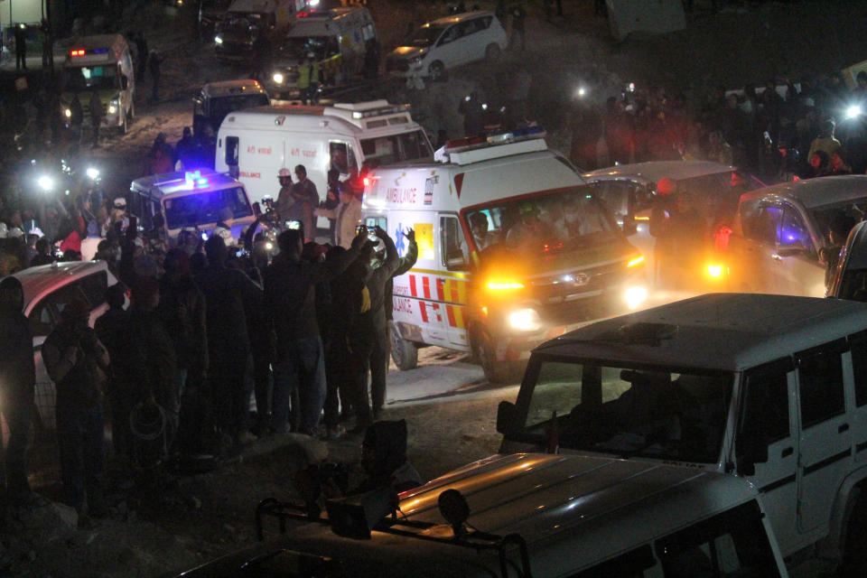 Ambulances drive past carrying workers rescued from the site of an under-construction road tunnel that collapsed in Silkyara in the northern Indian state of Uttarakhand, India, Tuesday, Nov. 28, 2023. India’s transportation minister says all 41 construction workers who were trapped in a collapsed mountain tunnel in the country’s north have been pulled out. (AP Photo)