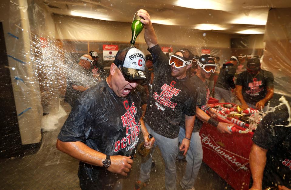 Manager Terry Francona celebrates after Cleveland defeated the Detroit Tigers 7-4  on Sept. 26, 2016. Cleveland clinched the AL Central. (AP Photo/Paul Sancya)