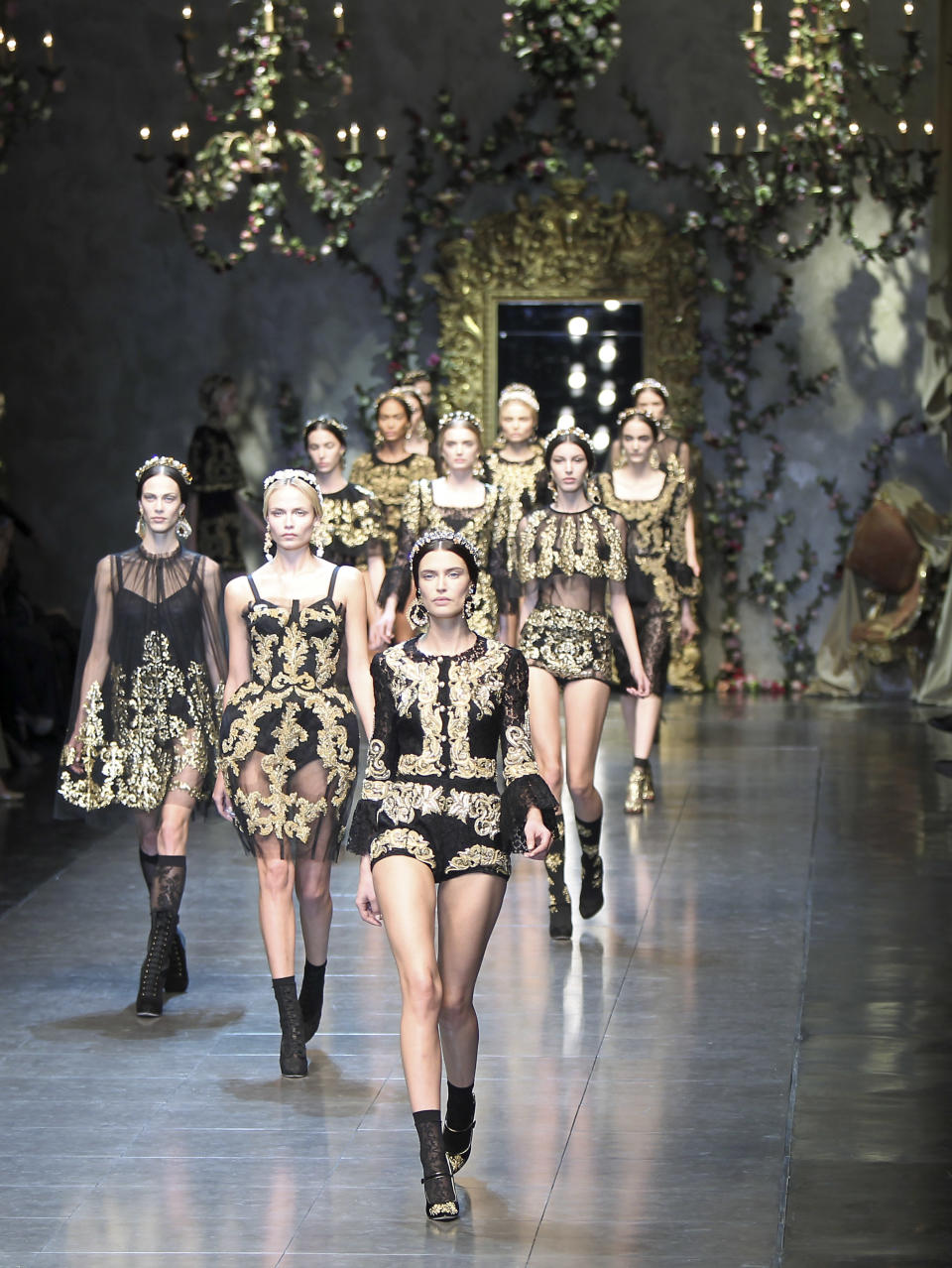 Models wear creations part of the Dolce & Gabbana women's Fall-Winter 2012-13 fashion collection, during the fashion week in Milan, Italy, Sunday, Feb. 26, 2012. (AP Photo/Antonio Calanni)