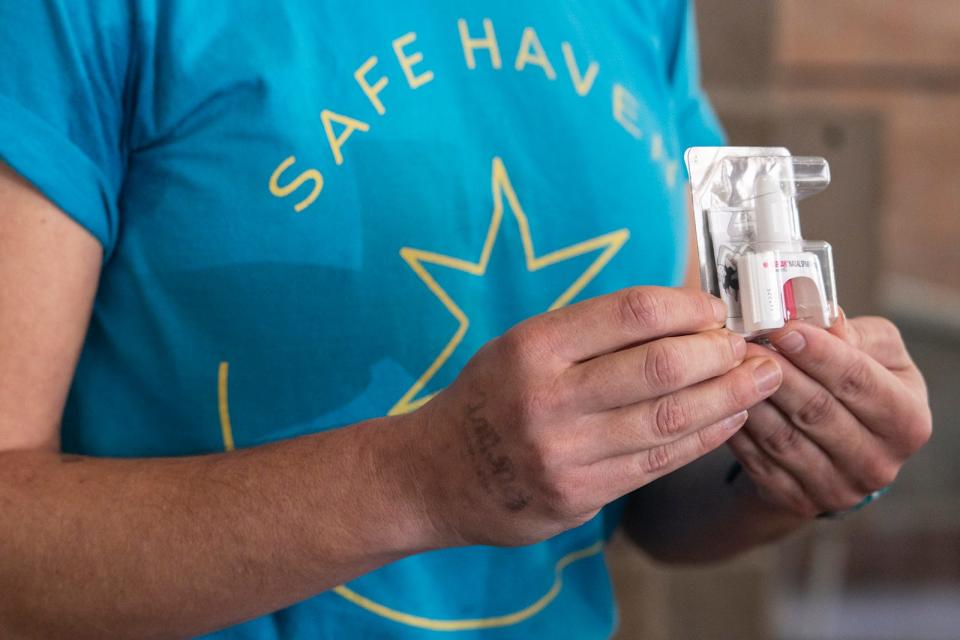 Christie Mokry of Safe Haven displays a nasal spray version of Narcan, the brand name of naloxone, which is used to treat opioid overdoses. Some bars in downtown Austin will now carry the life-saving drug for emergencies.