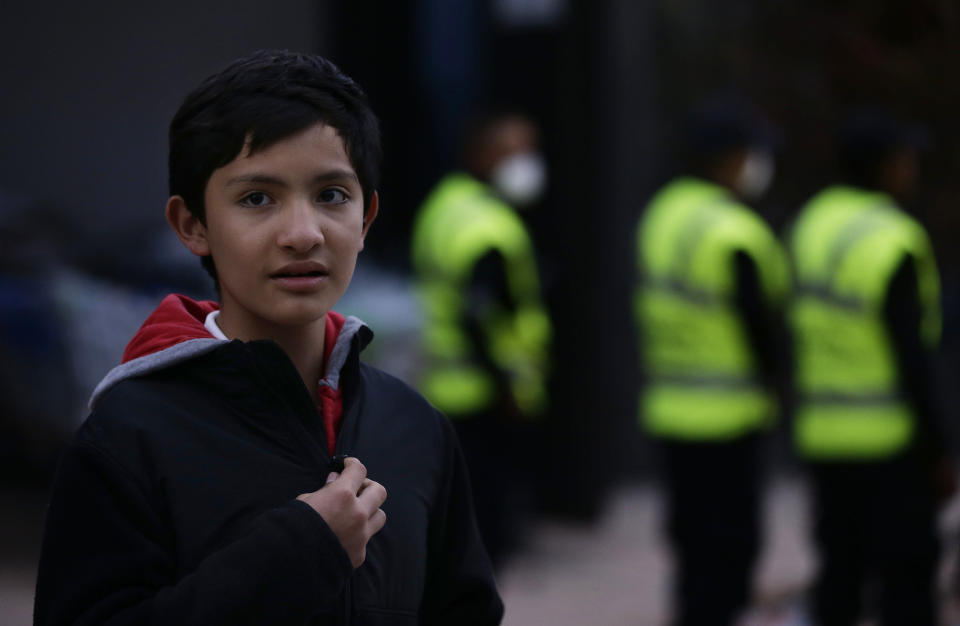 <p>Rodrigo Arelia, a student who escaped from the rubble of his Enrique Rebsamen school, stands outside the building that collapsed during an earthquake in Mexico City, Wednesday, Sept. 20, 2017. (Photo: Marco Ugarte/AP) </p>