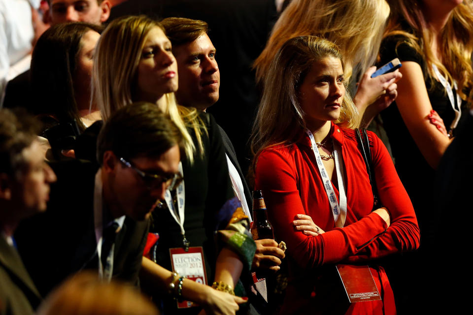 Spectators watch the election results shown on a television during Mitt Romney's campaign election night event at the Boston Convention & Exhibition Center on November 6, 2012 in Boston, Massachusetts. (Photo by Matthew Cavanaugh/Getty Images)