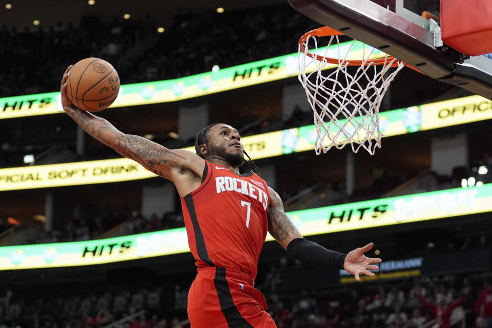 Houston Rockets' Cam Whitmore goes up to dunk the ball against the Los Angeles Clippers during the first half of an NBA basketball game Wednesday, March 6, 2024, in Houston. (AP Photo/David J. Phillip)