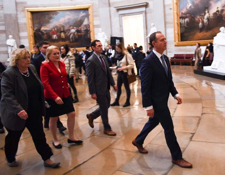 House Impeachment Manager Adam Schiff (D-CA) (R) leads other impeachment mangers to the Sentate chambers for the impeachment vote on Capitol Hill in Washington, DC on February 5, 2020. - Republican Senator Mitt Romney of Utah said US President Donald Trump is guilty of an "appalling abuse of public trust" and he will vote to convict him later at his Senate impeachment trial. Romney is likely to be the only Republican voting to convict Trump when the Senate considers the House of Representatives articles impeaching the president for abuse of power and obstruction of Congress. (Photo by Brendan Smialowski / AFP) (Photo by BRENDAN SMIALOWSKI/AFP via Getty Images) ** OUTS - ELSENT, FPG, CM - OUTS * NM, PH, VA if sourced by CT, LA or MoD **