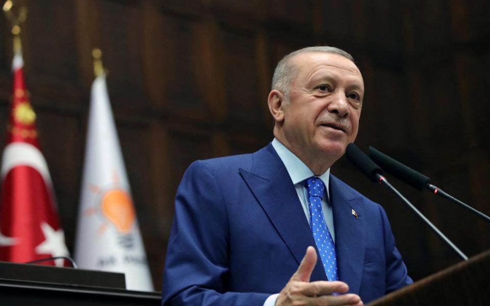 Turkish President Tayyip Erdogan addresses members of his ruling AK Party (AKP) during a meeting at the parliament in Ankara, Turkey on May 18, 2022.  - Murat Cetinmuhurdar/Reuters