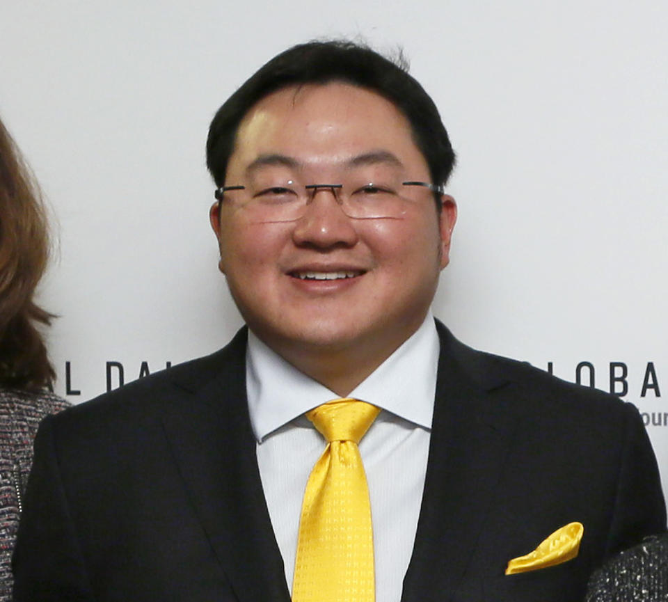 FILE - In this April 23, 2015 file photo, Jho Low, Director of the Jynwel Foundation, poses at the launch of the Global Daily website in Washington, D.C. The Justice Department on Thursday, Nov. 1, 2018, charged the fugitive Malaysian financier in a money laundering and bribery scheme that pilfered billions of dollars from a Malaysian investment fund created to promote economic development projects in that country. The three-count indictment charges Low Taek Jho, who is also known as Jho Low, with misappropriating money from the state-owned fund and using it for bribes and kickbacks to foreign officials, to pay for luxury real estate, art and jewelry in the United States and to fund Hollywood movies, including "The Wolf of Wall Street." (Photo by Stuart Ramson/Invision for the United Nations Foundation/AP Images)