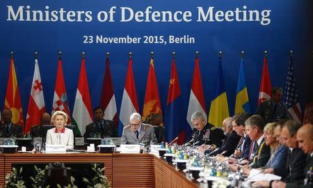 German Defence Minister Ursula von der Leyen (L) opens the Ministers of Defence Meeting at the Julius Leber barracks in Berlin, Germany, November 23, 2015. REUTERS/Hannibal Hanschke