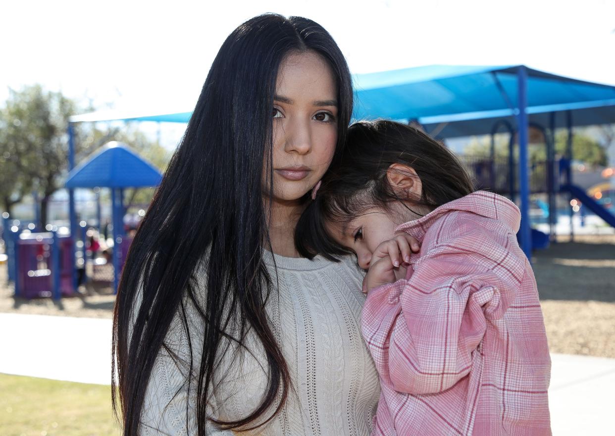 Maria Aylin Sotelo Comacho holds her daughter Amelie this week in La Quinta.