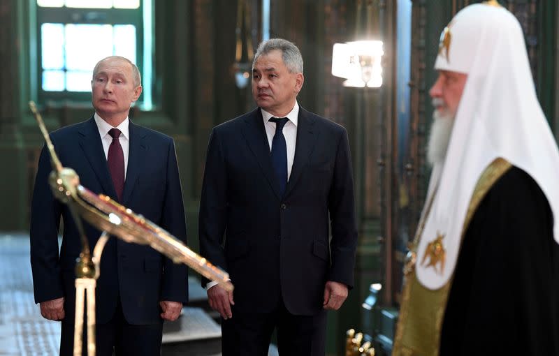 FILE PHOTO: Russia's President Putin visits the main Orthodox Cathedral of the Russian Armed Forces near Moscow
