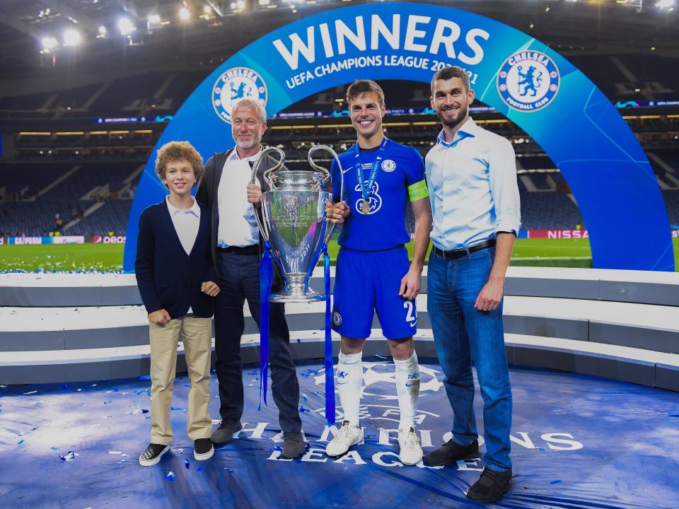 Chelsea FC owner, Roman Abramovich and Cesar Azpilicueta of Chelsea celebrate with the Champions League Trophy after winning the UEFA Champions League Final between Manchester City and Chelsea FC at Estadio do Dragao on May 29, 2021 in Porto, Portugal.