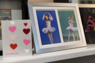 Ballet photos of Kate and Sutton Bulkeley are displayed on a mantle, Friday, Feb. 16, 2024, in Westport, Conn. No longer just a distraction or a way to connect with friends, social media has matured into a physical space and a community that almost all U.S. teenagers belong to. Up to 95% of teenagers say they use social media, with more than one-third saying they are on it “almost constantly,” according to the Pew Research Center. (AP Photo/Julia Nikhinson)