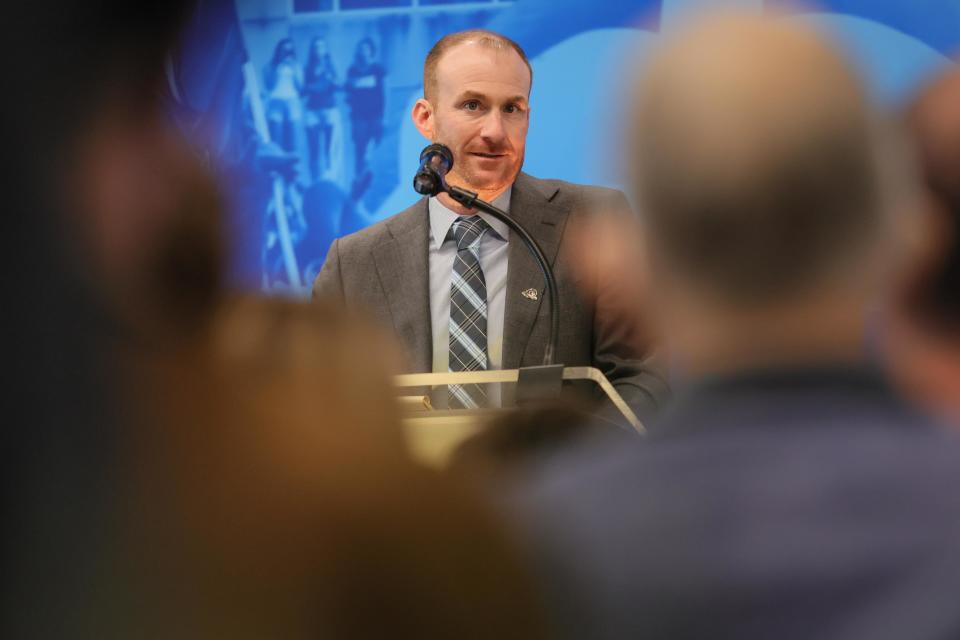 Delaware football head coach Ryan Carty gives remarks during a press conference to introduced Carty as Delaware football coach Monday.