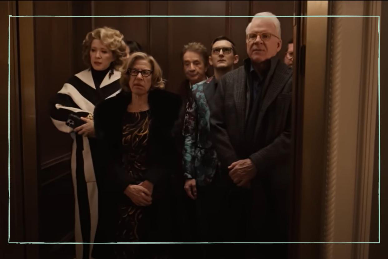  The cast of Only Murders in the Building standing in an elevator 