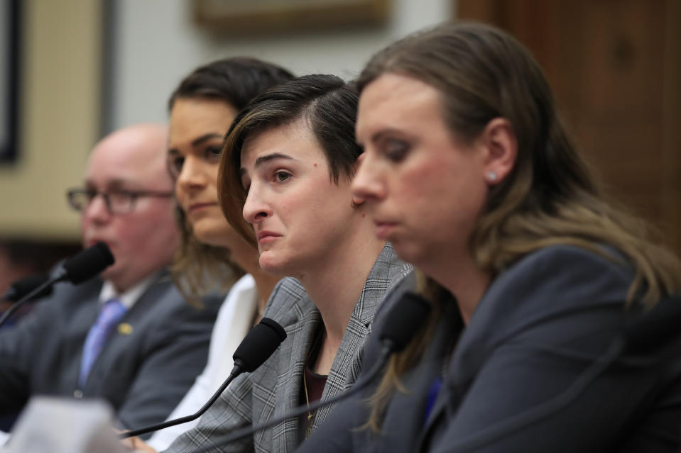 From left, transgender military members Navy Lt. Cmdr. Blake Dremann, Army Capt. Alivia Stehlik, Army Capt. Jennifer Peace and Army Staff Sgt. Patricia King, listen to an emotional committee member Rep. Debra Haaland, D-N.M. relate to the witnesses about her daughter who is gay during a House Armed Services Subcommittee on Military Personnel hearing on Capitol Hill in Washington, Wednesday, Feb. 27, 2019. This is the first ever hearing that transgender military members openly testified in Congress. (AP Photo/Manuel Balce Ceneta)