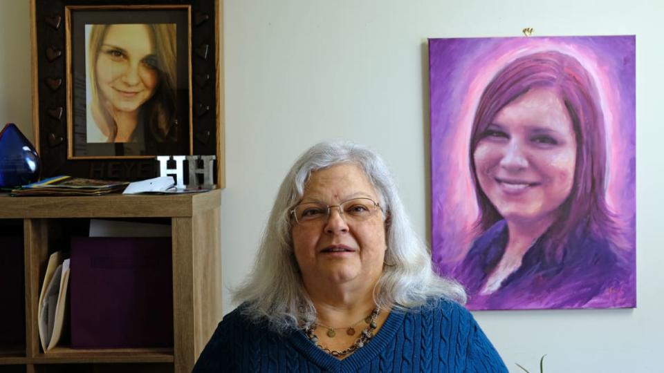 <div class="inline-image__caption"><p>Susan Bro poses with a photo and portrait of her daughter, Heather Heyer.</p></div> <div class="inline-image__credit">Norm Shafer/ For The Washington Post via Getty</div>