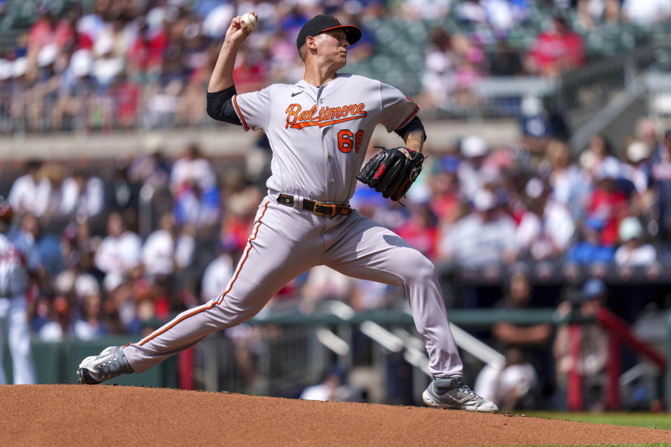 Baltimore Orioles starting pitcher Tyler Wells throws in the first inning of a baseball game against the Atlanta Braves on Sunday, May 7, 2023, in Atlanta. (AP Photo/Erik Rank)